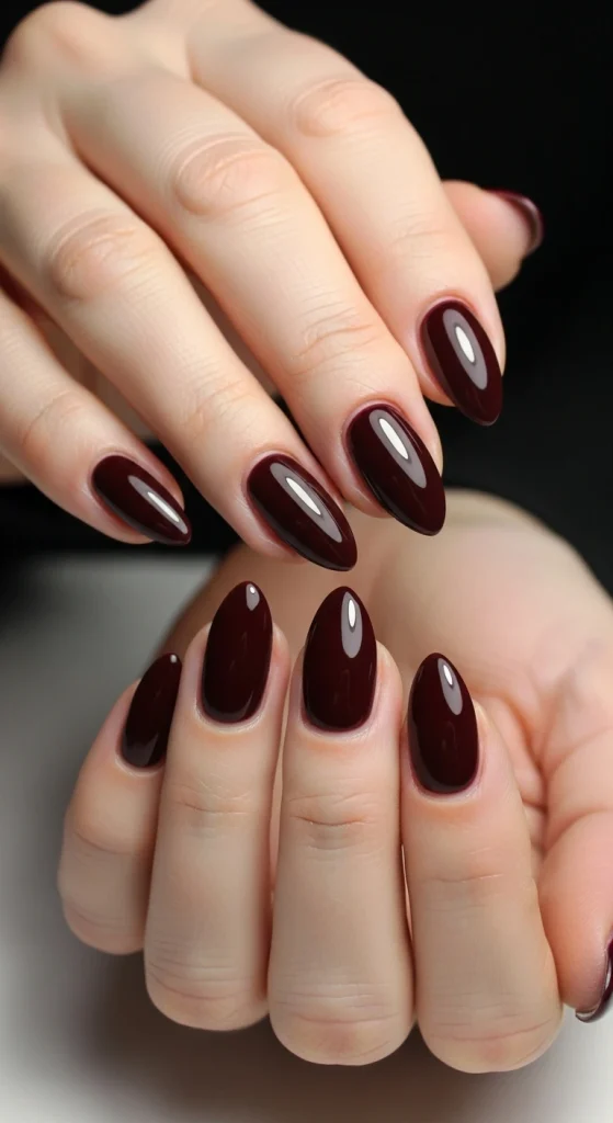 Dark Maroon Nails with a Glossy Top Coat