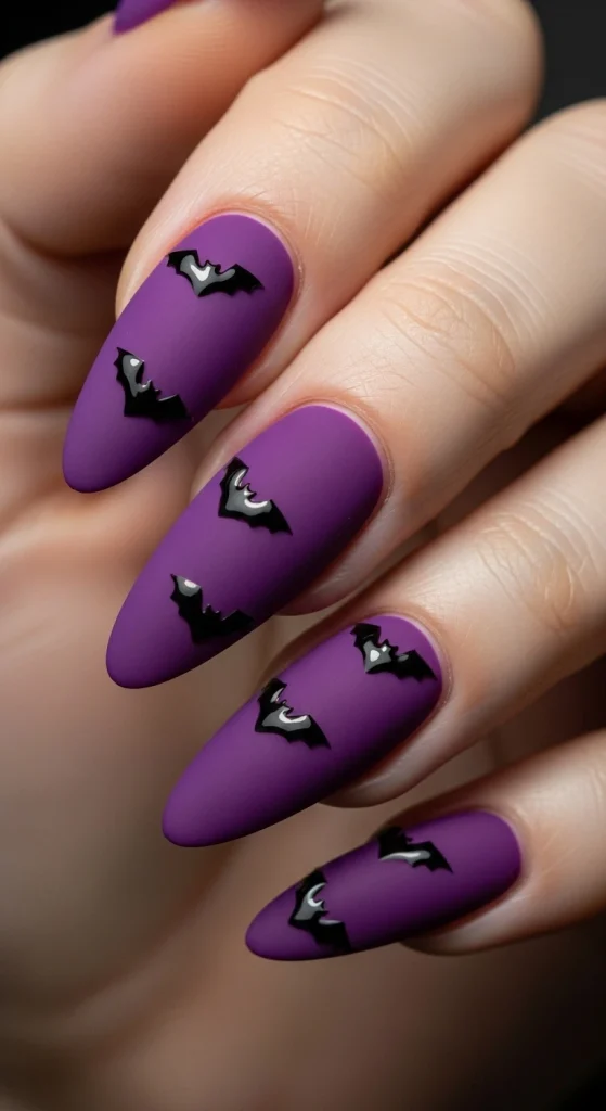 Matte Purple Nails with Tiny Bat Designs