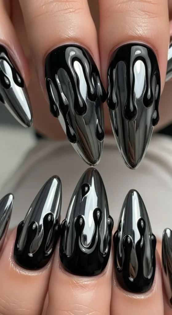 Metallic Chrome Nails with Black Drip Designs