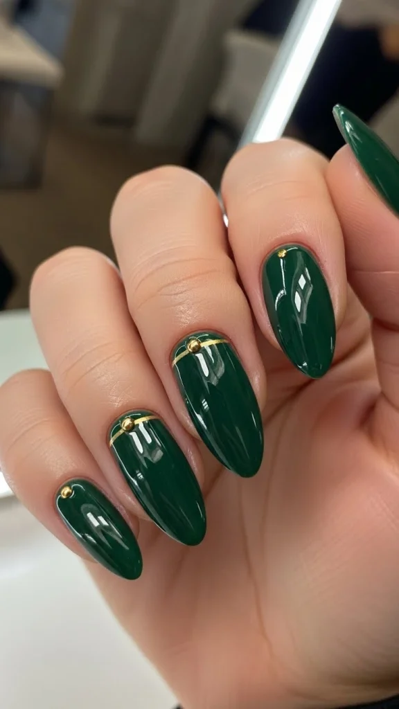 Evergreen Chic Nails with Minimal Gold Detailing
